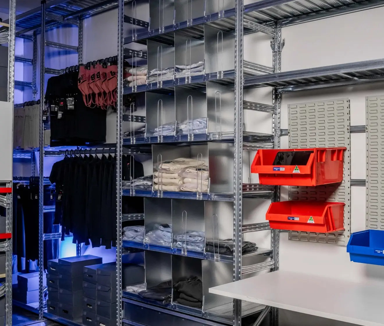 Warehouse stockroom accessories including shelving bins and dividers for efficient inventory organisation